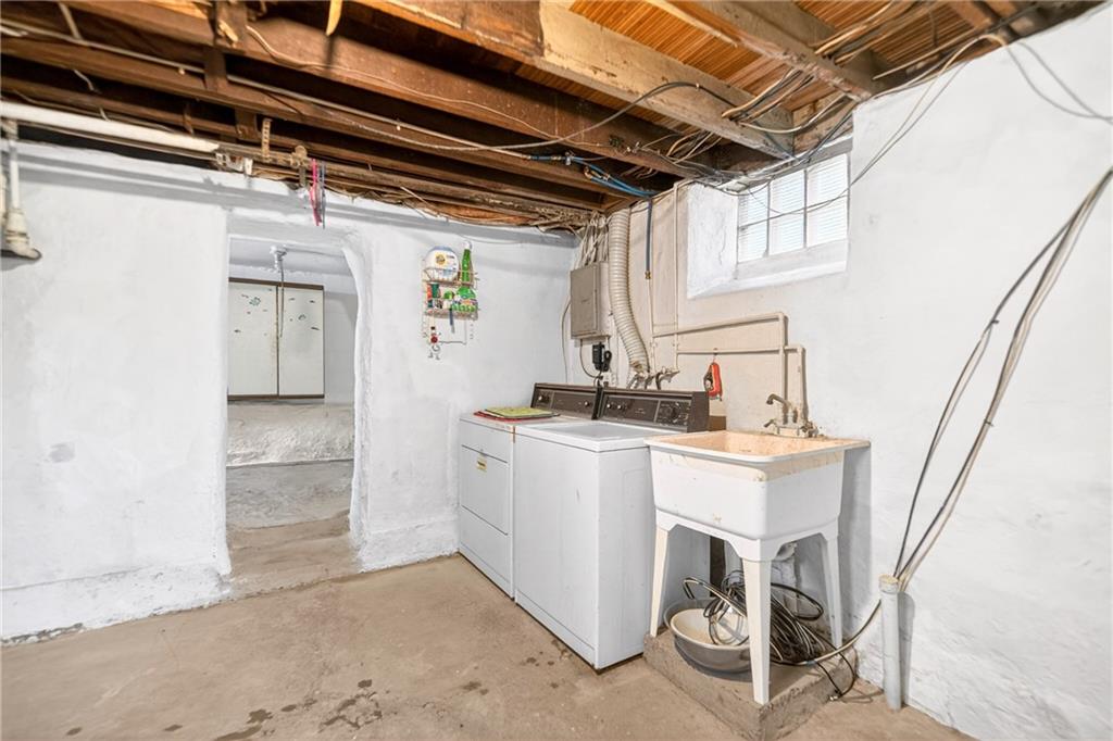 520 Stokes Avenue Braddock, PA 15104 - Photo 24 of 47 a utility room with dryer and washer