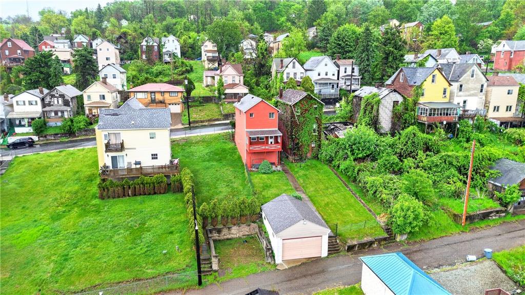 520 Stokes Avenue Braddock, PA 15104 - Photo 26 of 47 aerial view of a house with a garden and houses