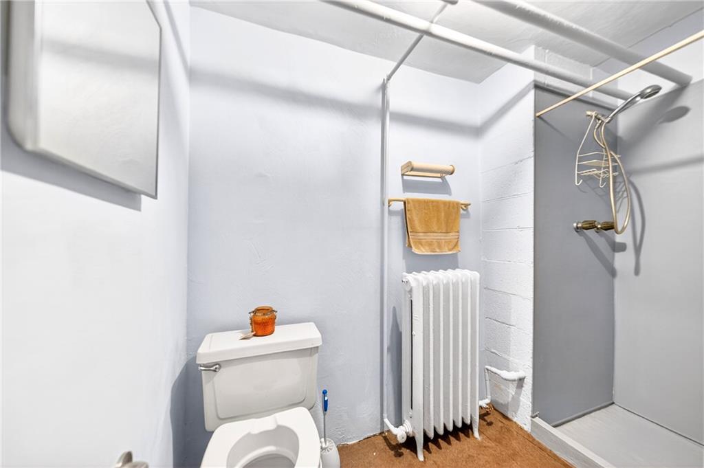 520 Stokes Avenue Braddock, PA 15104 - Photo 33 of 47 a bathroom with a toilet and a shower