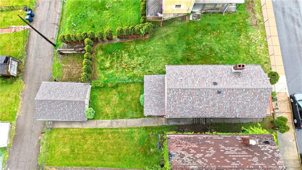 520 Stokes Avenue Braddock, PA 15104 - Photo 37 of 47 an aerial view of a house with a yard
