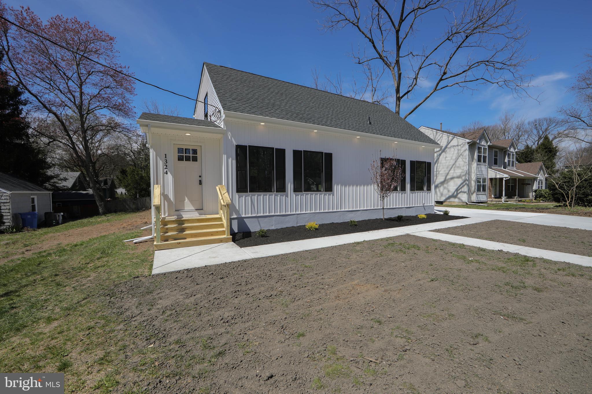 1324 Charleston Road Cherry Hill, NJ 08034 - Photo 1 of 34 a view of a house with a yard