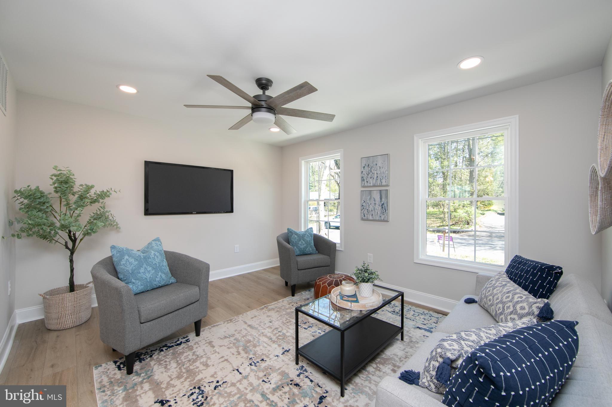 1324 Charleston Road Cherry Hill, NJ 08034 - Photo 17 of 34 a living room with furniture ceiling fan and a window
