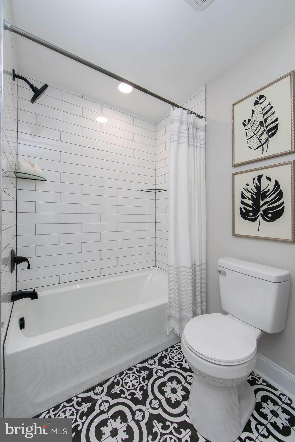 1324 Charleston Road Cherry Hill, NJ 08034 - Photo 23 of 34 a bathroom with a toilet and a bathtub
