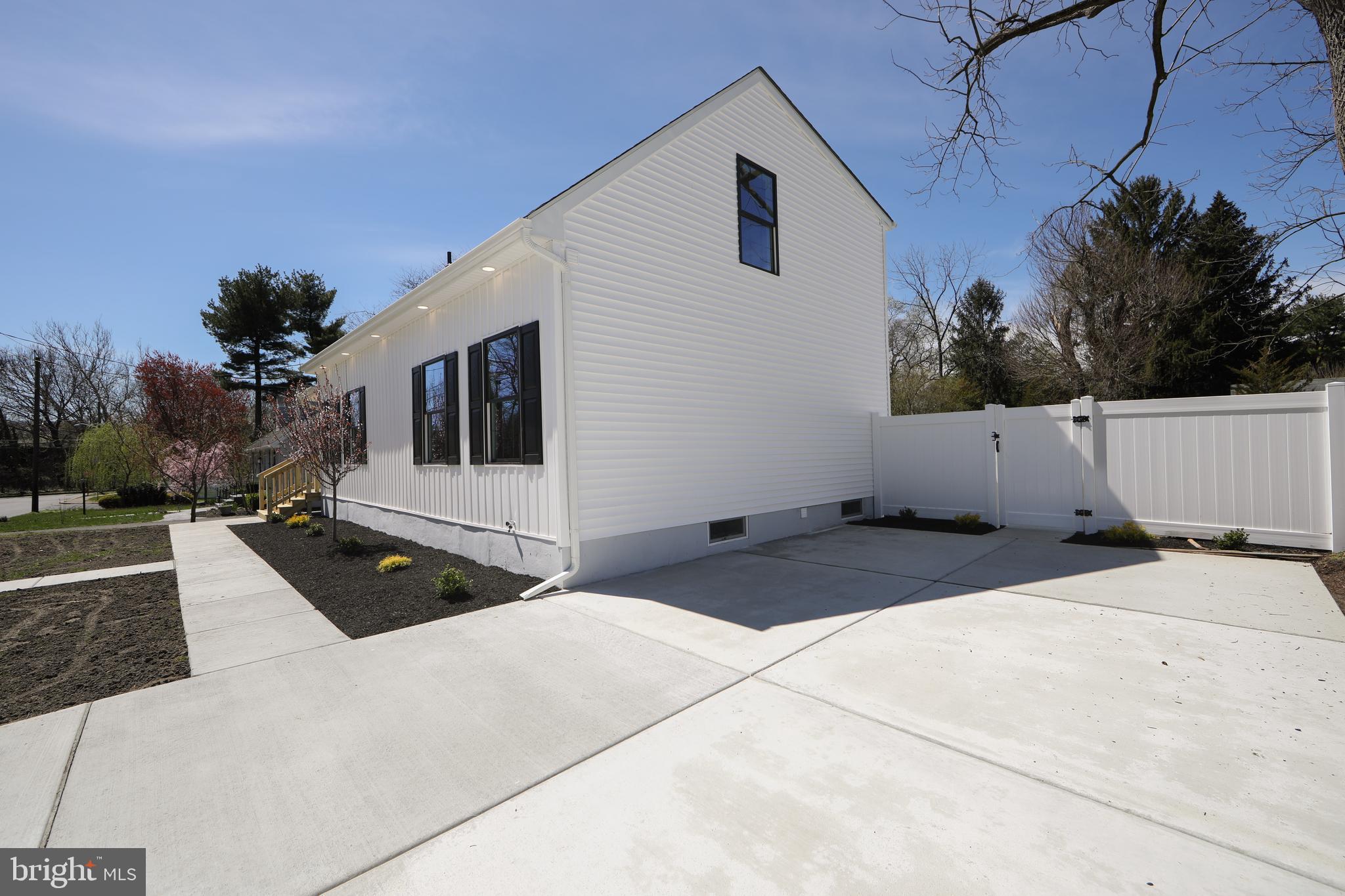 1324 Charleston Road Cherry Hill, NJ 08034 - Photo 3 of 34 a view of a house with backyard and trees in the background