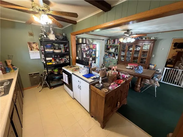 a view of a chairs and table in a room