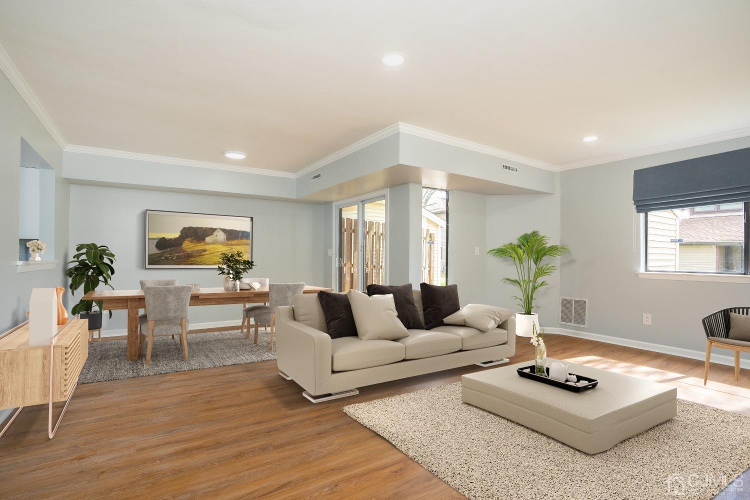 5505 Hana Road Edison, NJ 08817 - Photo 1 of 32 a living room with furniture and a wooden floor