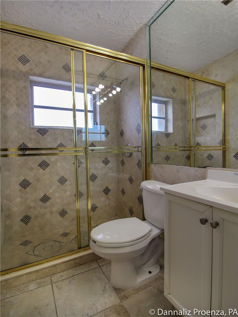4720 Betelnut Street Boca Raton, FL 33428 - Photo 11 of 16 Main bathroom
