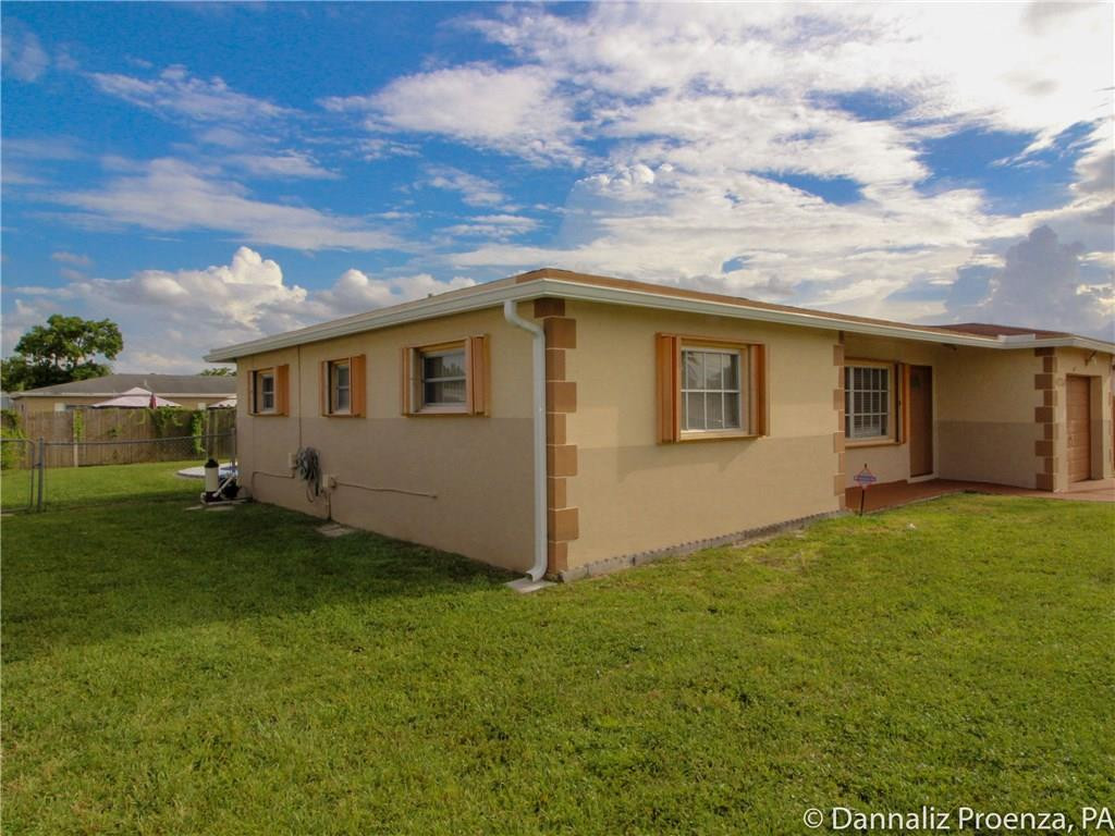 4720 Betelnut Street Boca Raton, FL 33428 - Photo 2 of 16 Front