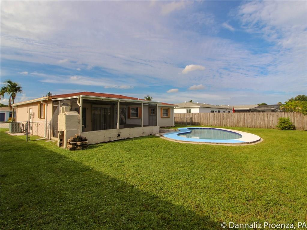 4720 Betelnut Street Boca Raton, FL 33428 - Photo 3 of 16 Large back yard with pool
