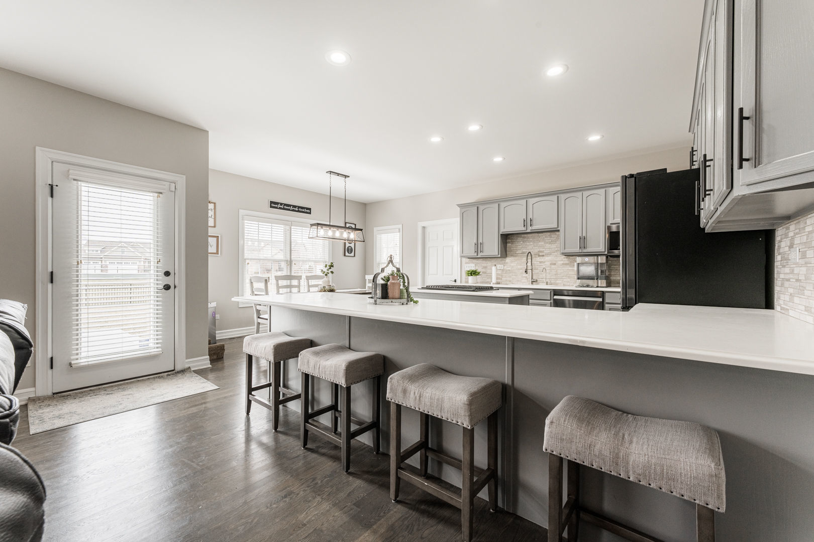 461 White Street Sycamore, IL 60178 - Photo 12 of 49 a large kitchen with a table and chairs in it