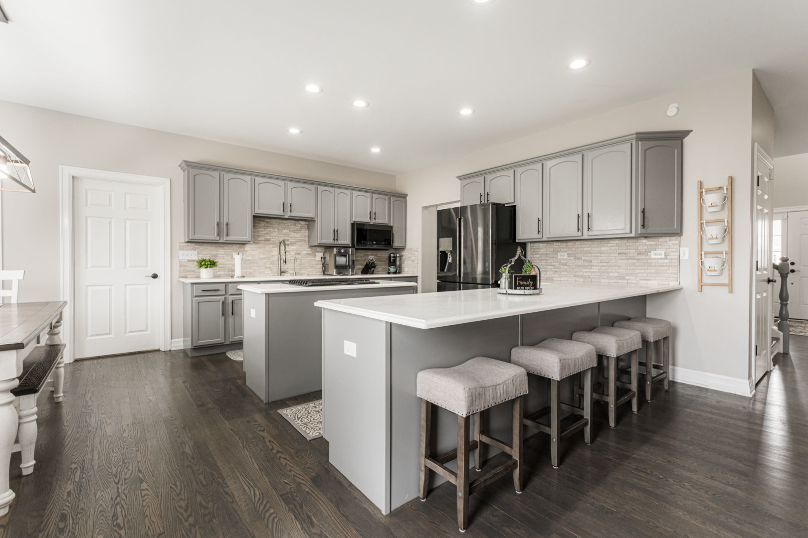 461 White Street Sycamore, IL 60178 - Photo 13 of 49 a kitchen with kitchen island granite countertop a center island stainless steel appliances and cabinets