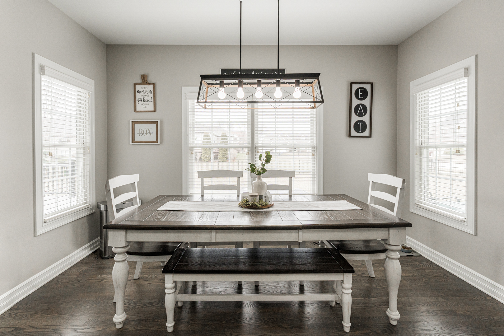 461 White Street Sycamore, IL 60178 - Photo 17 of 49 a kitchen with a table chairs and wooden floor