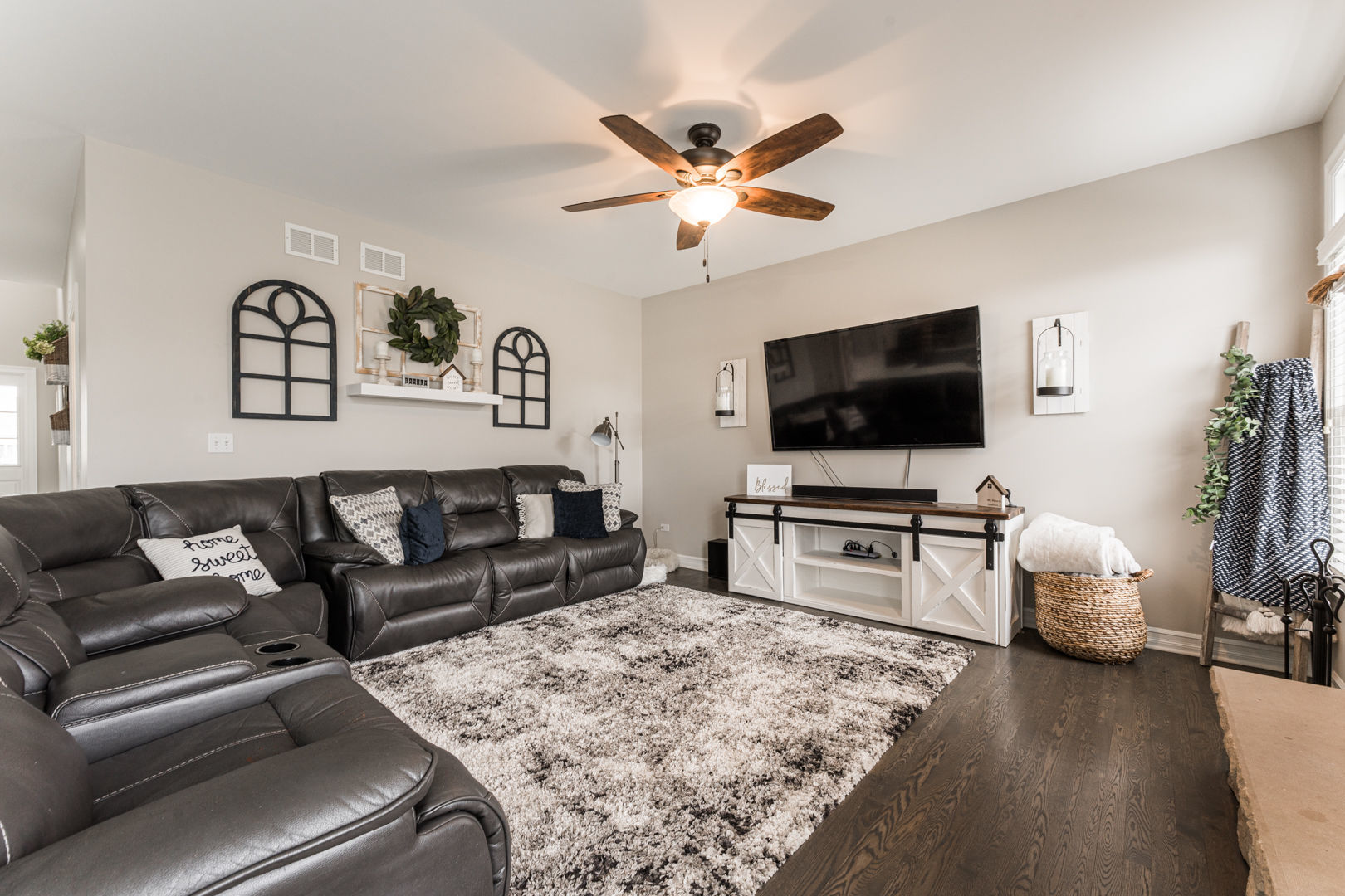 461 White Street Sycamore, IL 60178 - Photo 18 of 49 a living room with furniture and a flat screen tv