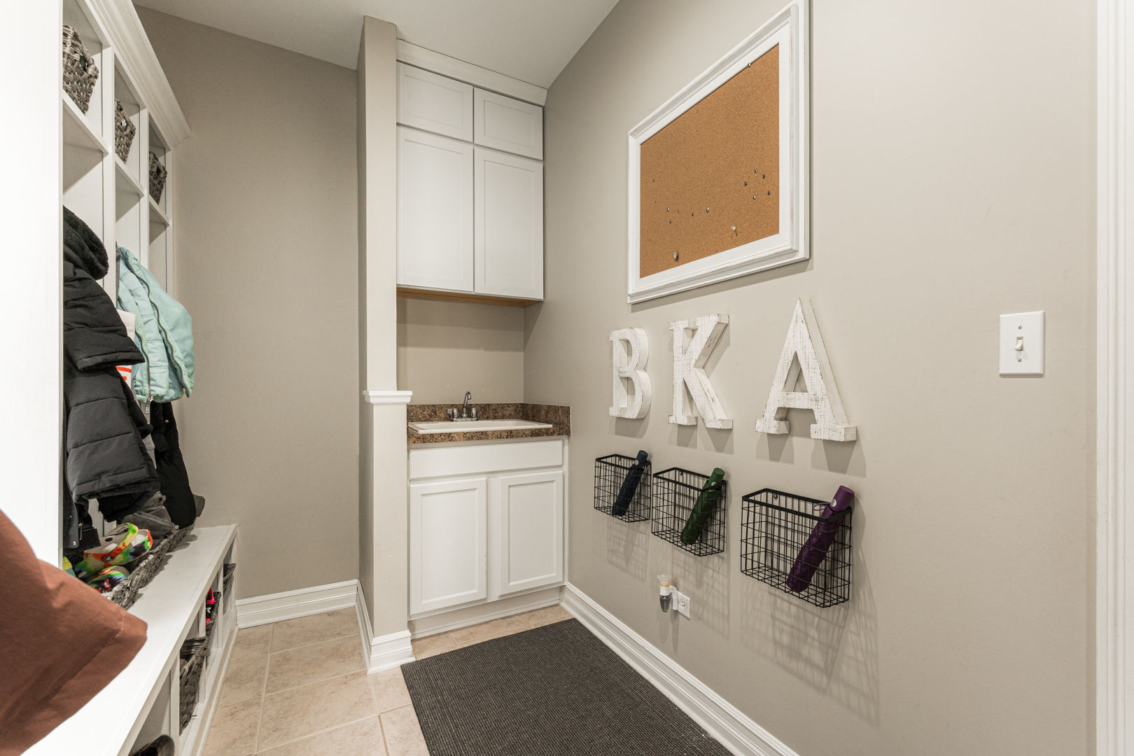 461 White Street Sycamore, IL 60178 - Photo 20 of 49 a kitchen with white cabinets and appliances