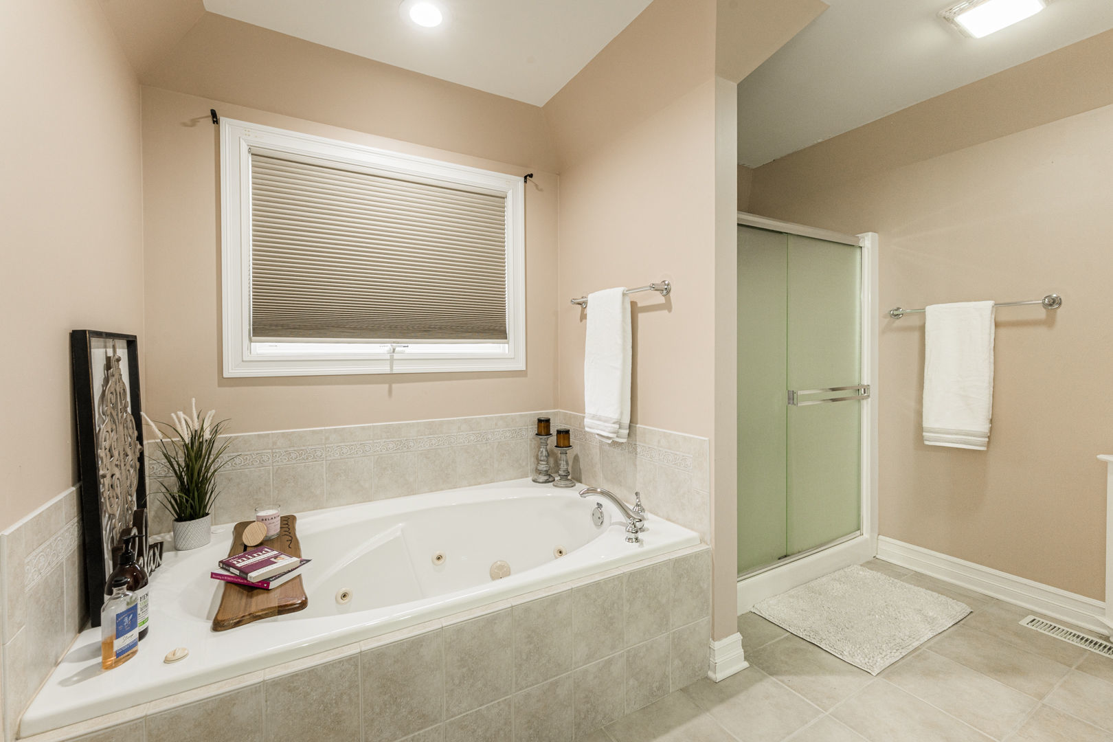 461 White Street Sycamore, IL 60178 - Photo 28 of 49 a bathroom with a tub a sink and a window