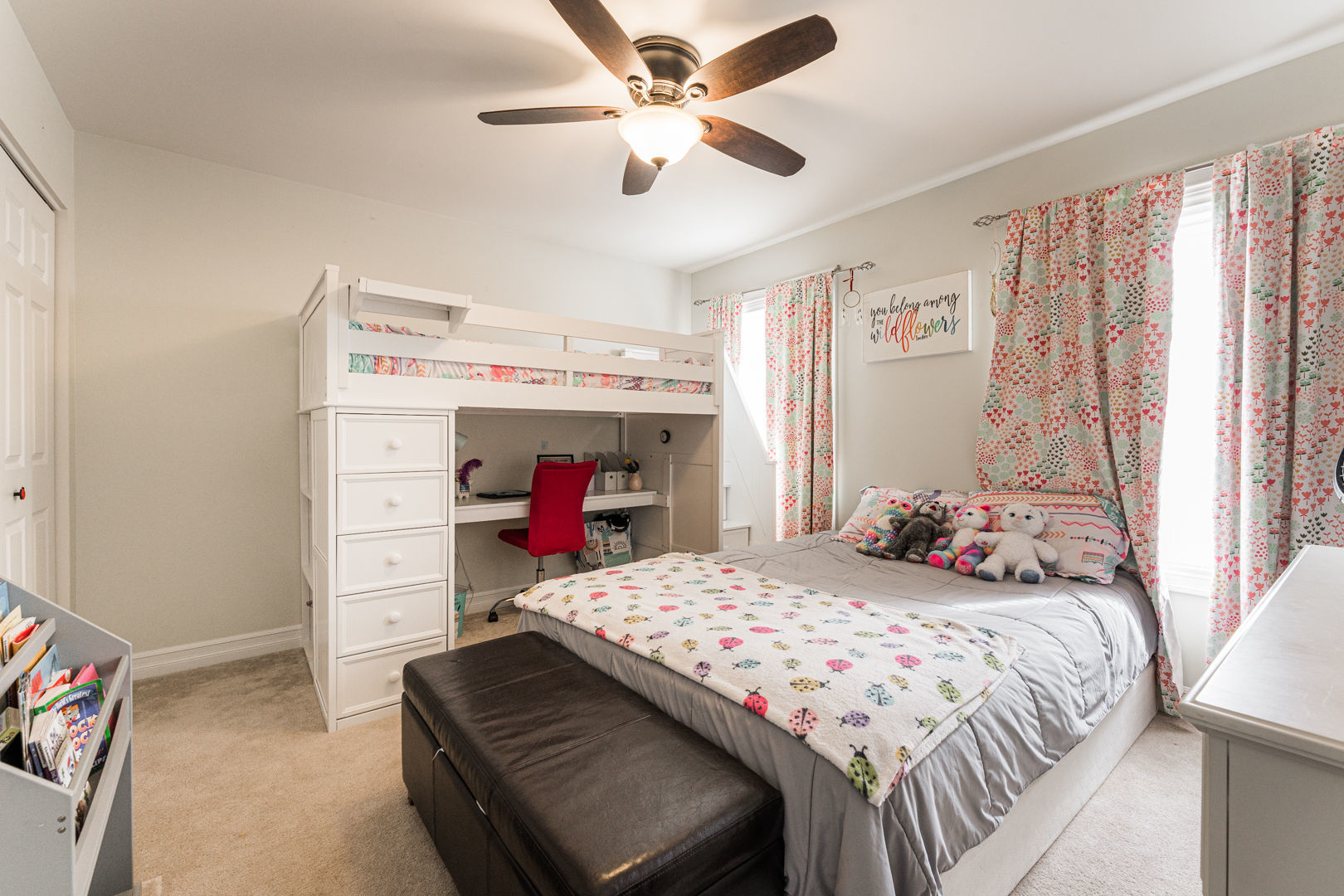 461 White Street Sycamore, IL 60178 - Photo 30 of 49 a bedroom with a bed and a chandelier