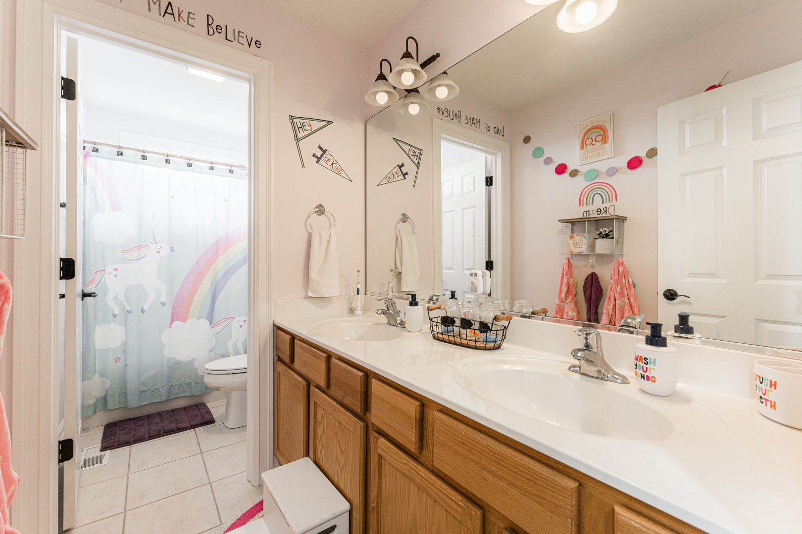 461 White Street Sycamore, IL 60178 - Photo 32 of 49 a bathroom with a double vanity sink mirror and shower