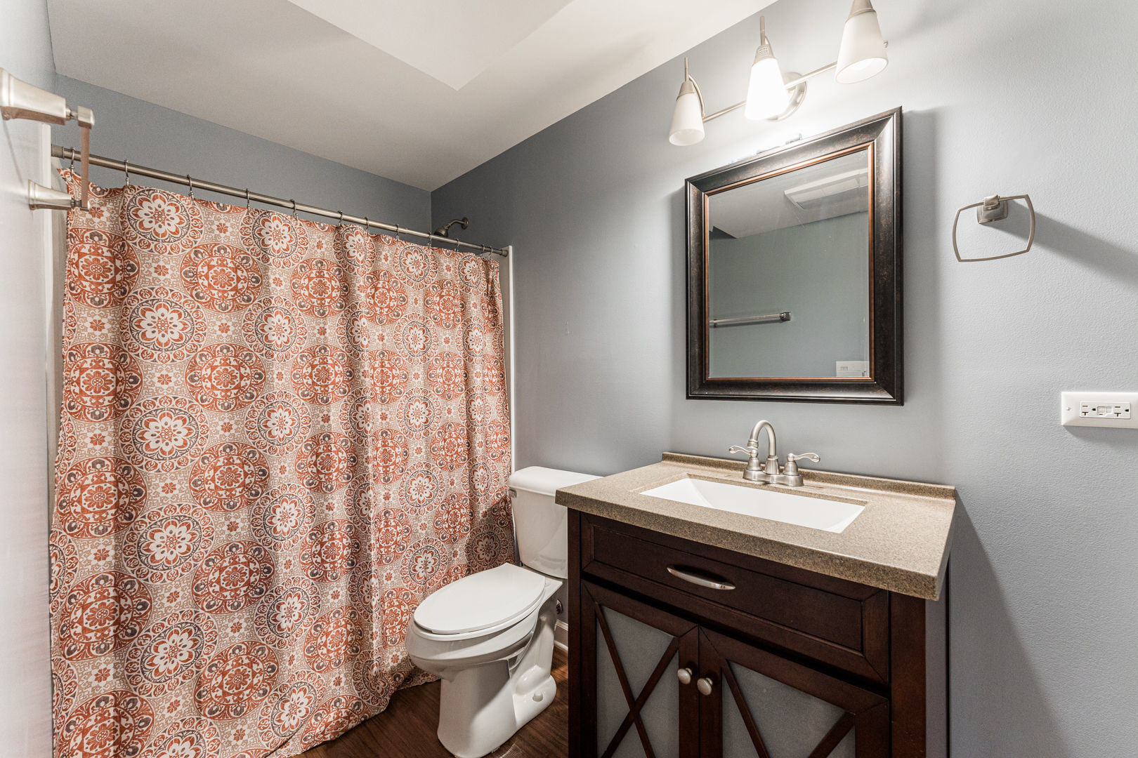 461 White Street Sycamore, IL 60178 - Photo 41 of 49 a bathroom with a toilet a sink and a mirror