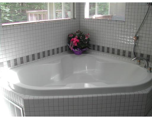 224 Country Way Needham, MA 02492 - Photo 14 of 20 a bathroom with a tub