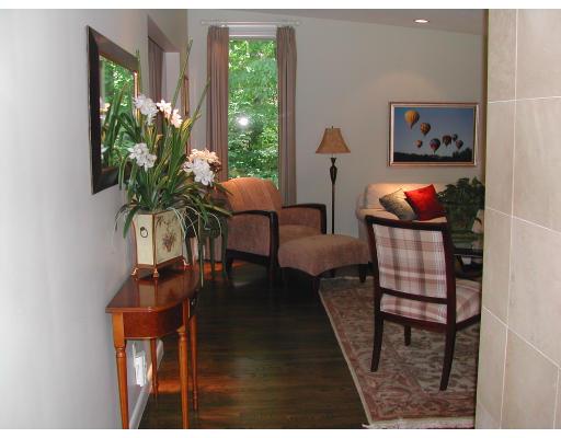 224 Country Way Needham, MA 02492 - Photo 15 of 20 a living room with furniture and a potted plant