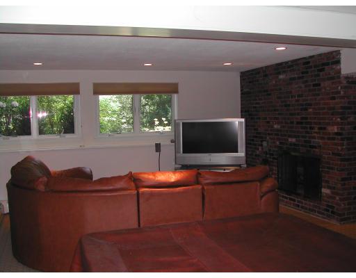 224 Country Way Needham, MA 02492 - Photo 18 of 20 a living room with furniture and a flat screen tv