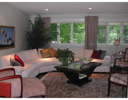 224 Country Way Needham, MA 02492 - Photo 2 of 20 a living room with furniture and a large window