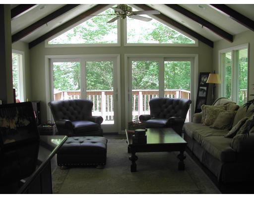 224 Country Way Needham, MA 02492 - Photo 4 of 20 a living room with furniture and a floor to ceiling window