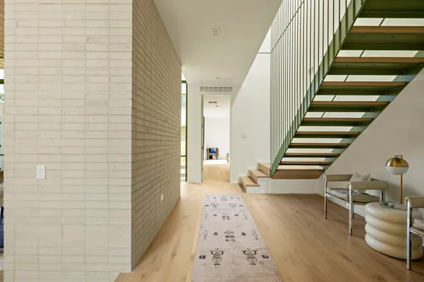 a view of entryway with wooden floor