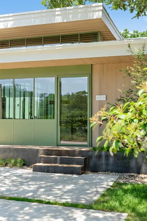 a view of swimming pool with a yard