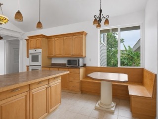 2107 Kaiwiki Road Hilo, HI 96720 - Photo 20 of 30 a kitchen with a sink and window