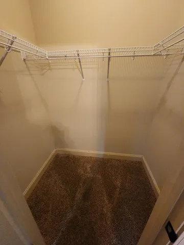 a view of a room with racks on the wall