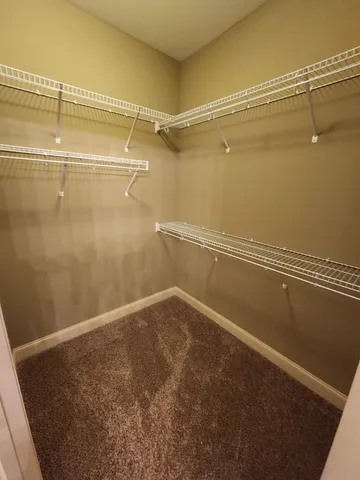 a view of a room with racks on the wall