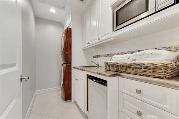 a kitchen with a stove and a refrigerator