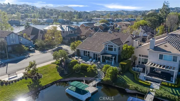 an aerial view of a house with a garden