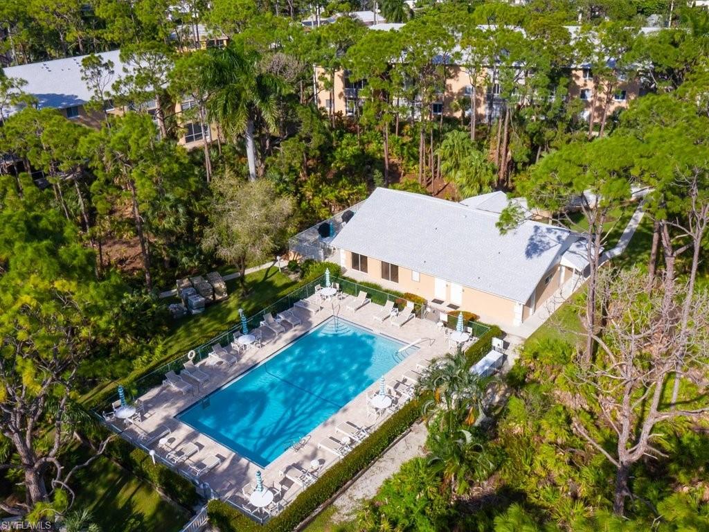 3012 Sandpiper Bay Circle, Unit D301 Naples, FL 34112 - Photo 17 of 23 an aerial view of a house