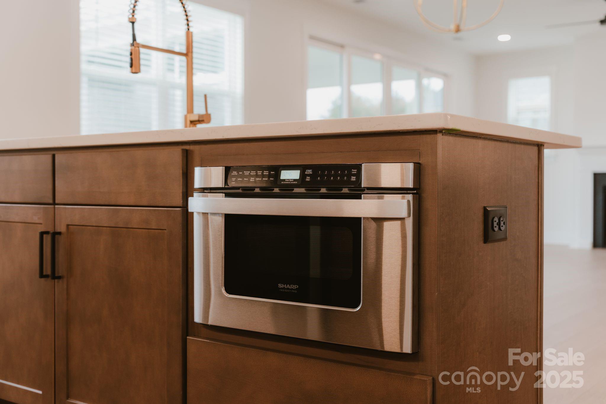 817 Garringer Place Charlotte, NC 28208 - Photo 14 of 33 a close view of a stove top oven sitting inside of a kitchen