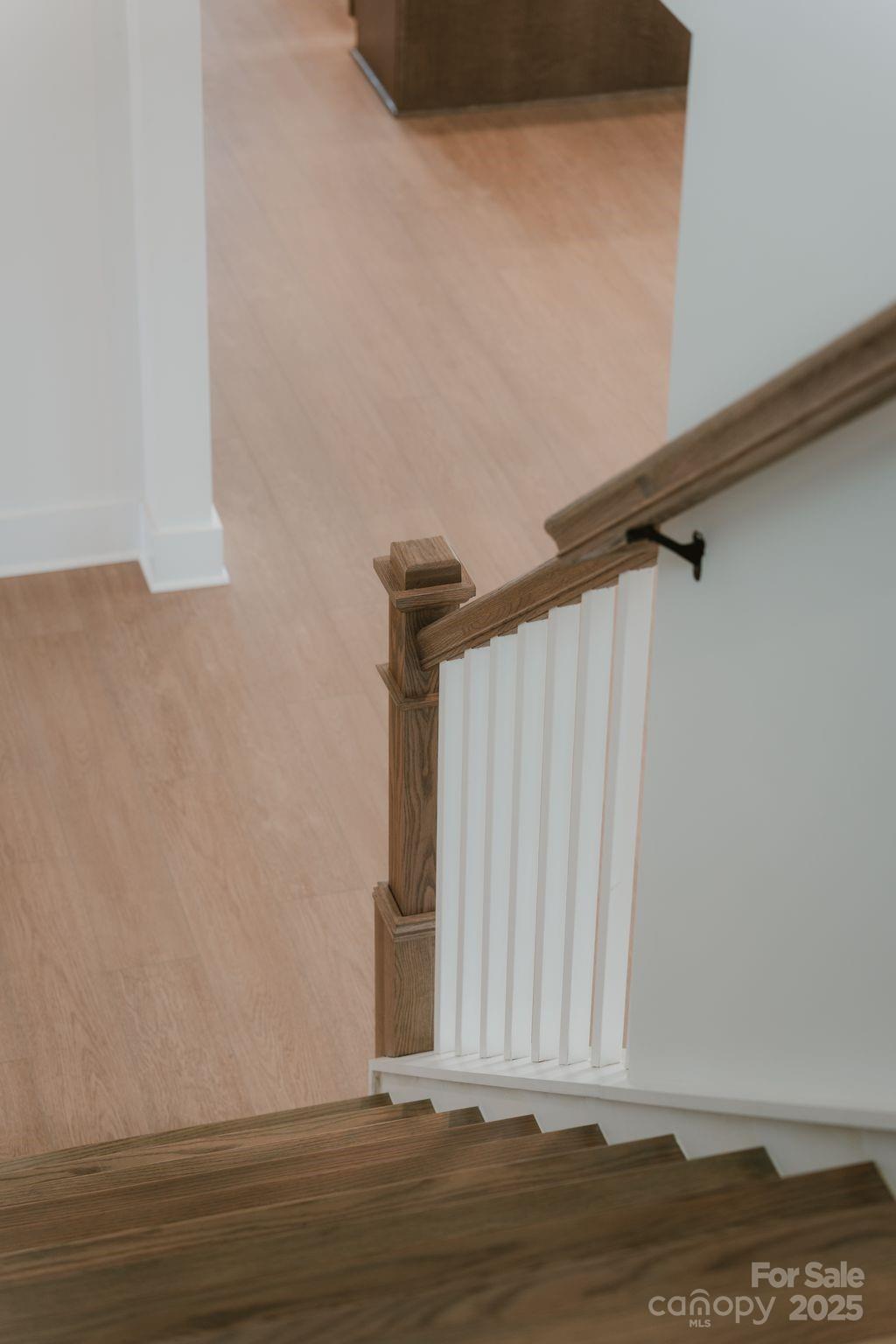 817 Garringer Place Charlotte, NC 28208 - Photo 21 of 33 a view of a room with wooden floor