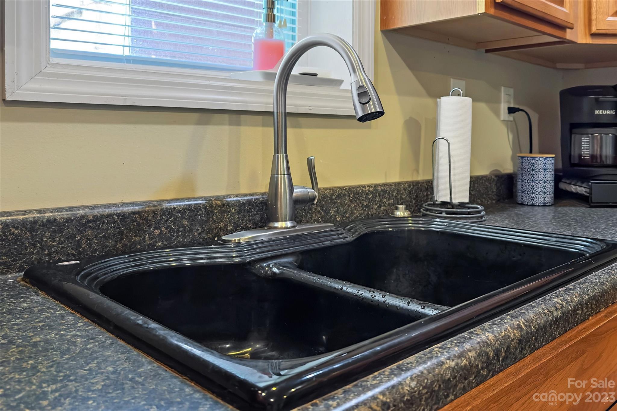 134 Spring Street Old Fort, NC 28762 - Photo 17 of 34 a kitchen that has a sink and a stove