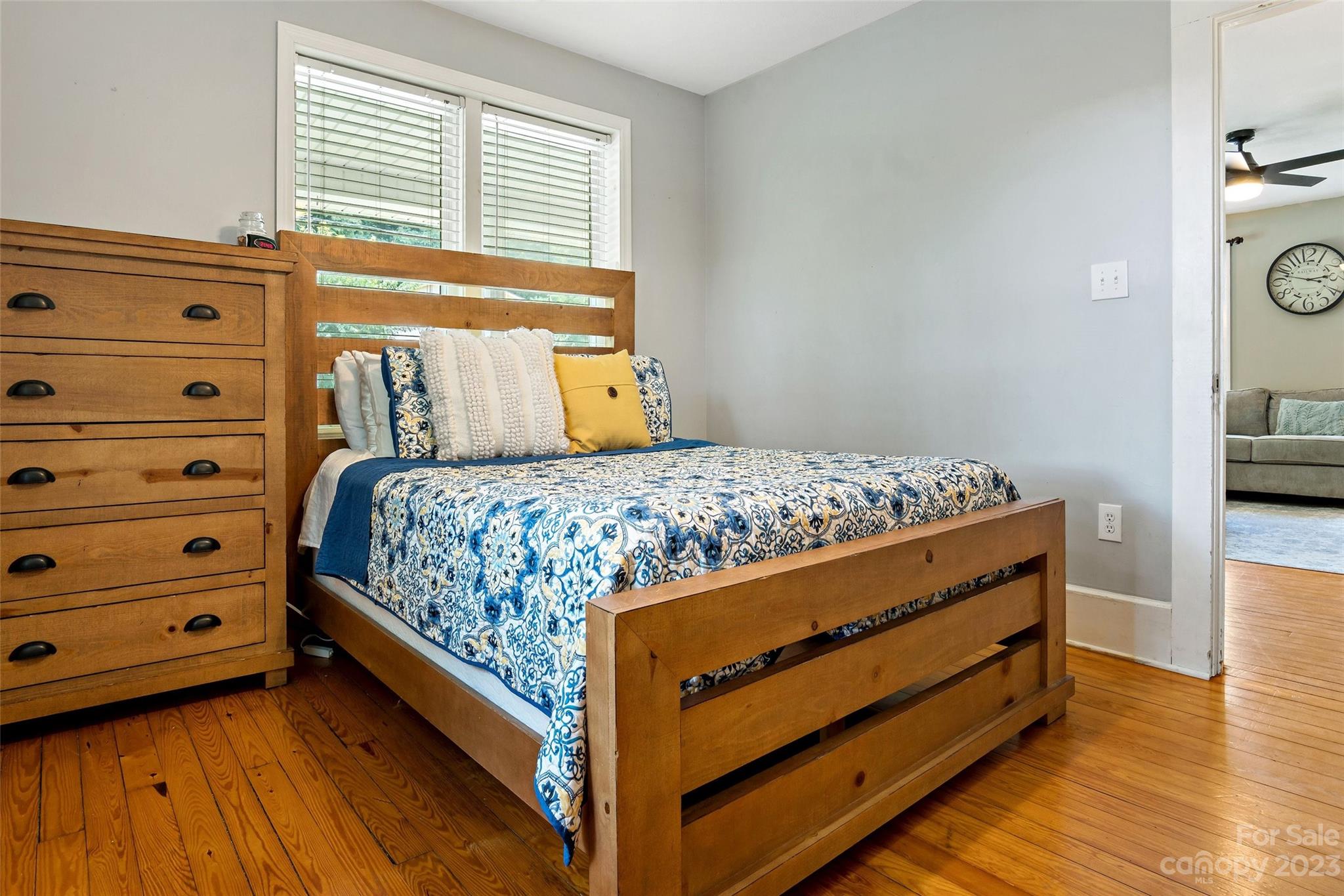 134 Spring Street Old Fort, NC 28762 - Photo 24 of 34 a bedroom with a bed and a dresser