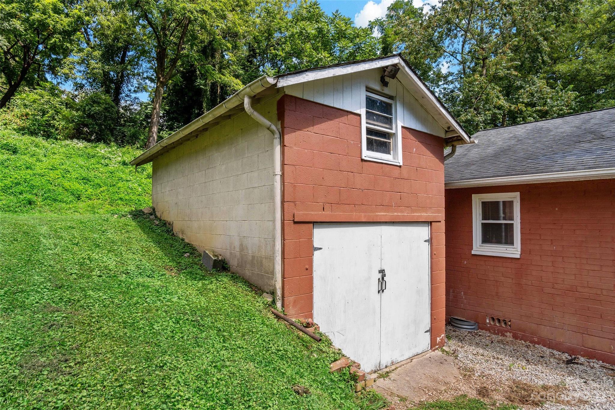 134 Spring Street Old Fort, NC 28762 - Photo 34 of 34 a backyard of a house with lots of green space