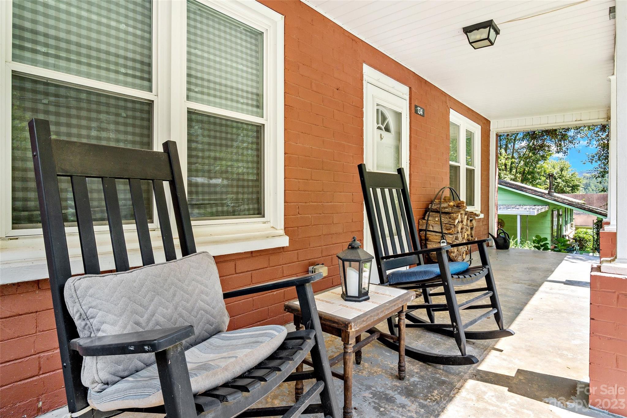 134 Spring Street Old Fort, NC 28762 - Photo 6 of 34 a view of a outdoor seating area