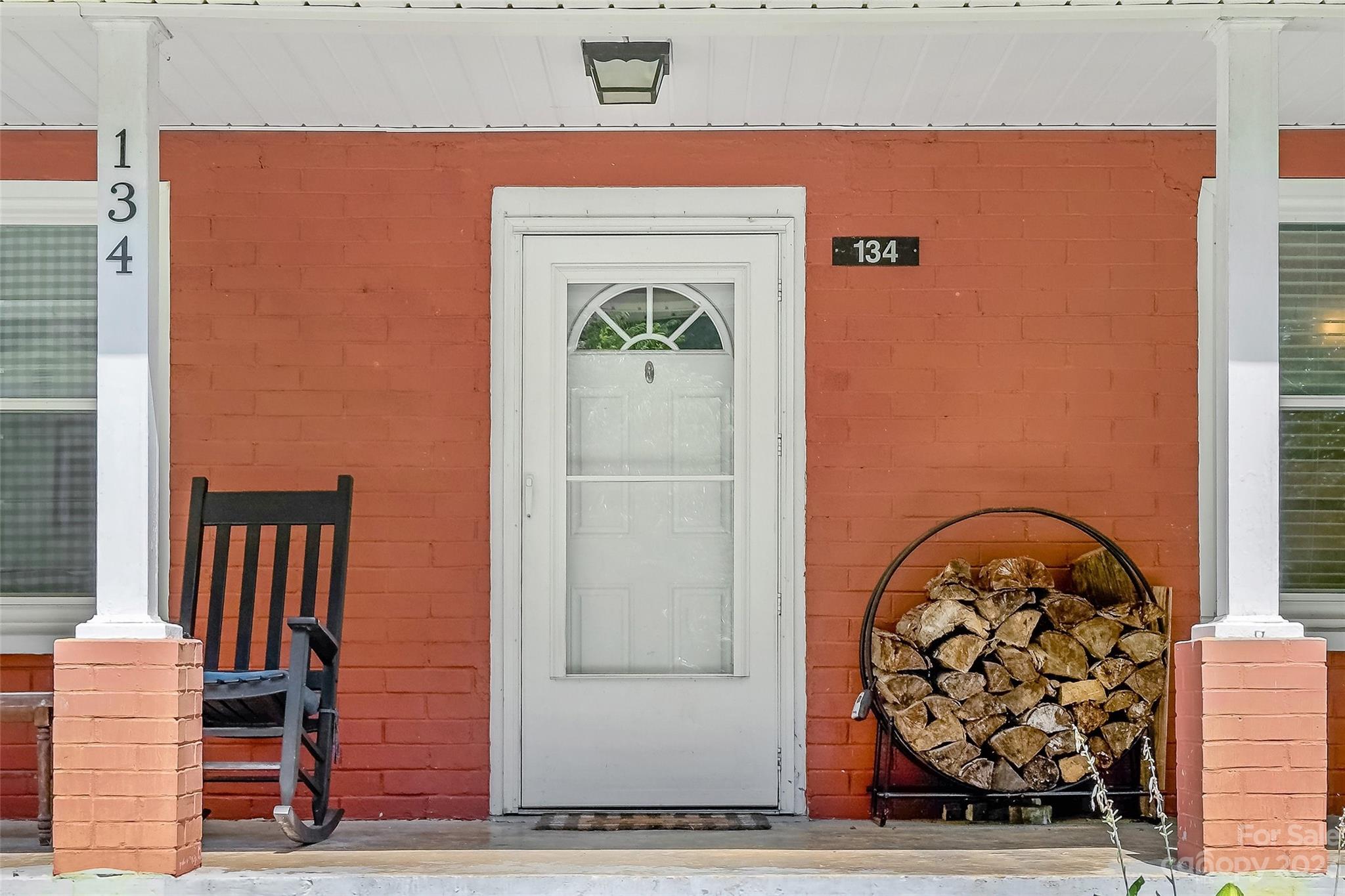 134 Spring Street Old Fort, NC 28762 - Photo 7 of 34 a front door view of a door