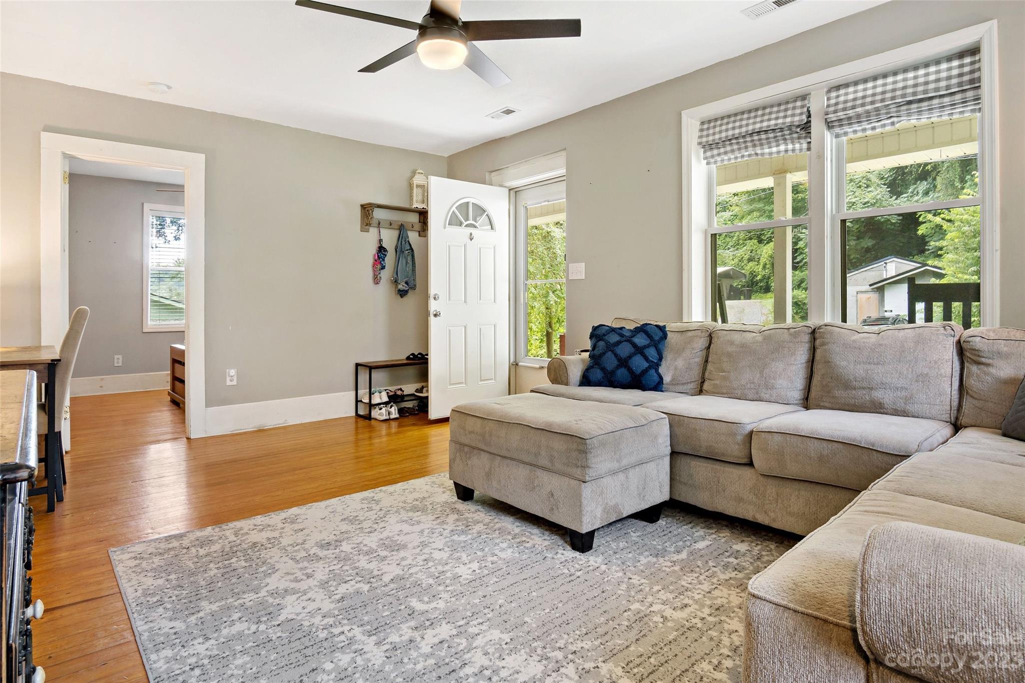134 Spring Street Old Fort, NC 28762 - Photo 9 of 34 a living room with furniture and a large window