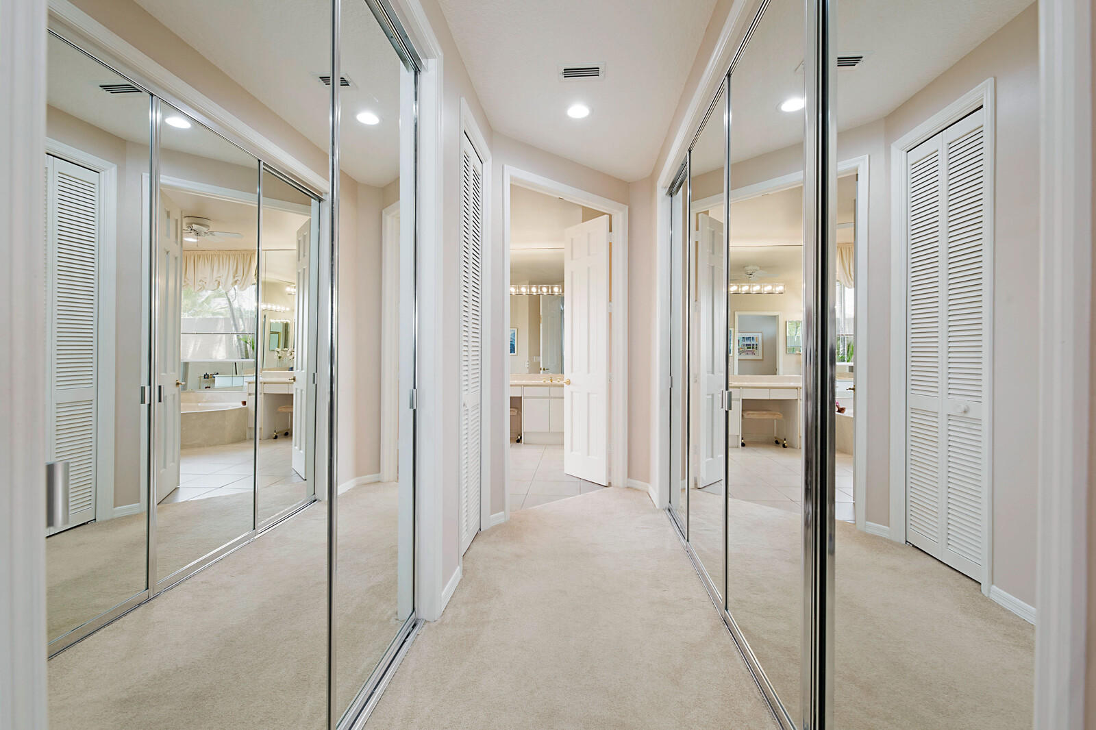 10614 Stonebridge Boulevard Boca Raton, FL 33498 - Photo 23 of 45 Master Closets / Hall to Bathroom