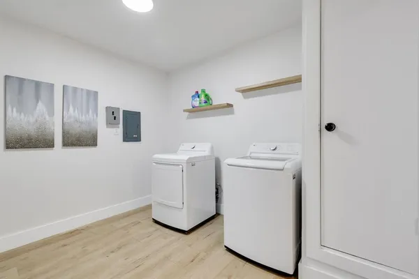 a utility room with dryer and washer