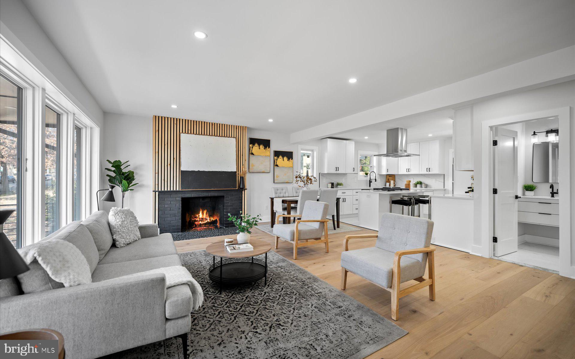 6605 3rd Street Northwest Washington, DC 20012 - Photo 1 of 1 a living room with furniture and a fireplace