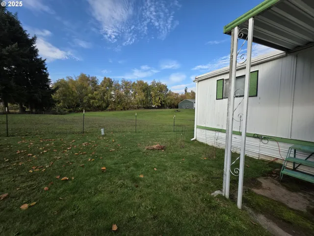 a view of a golf course with a lake