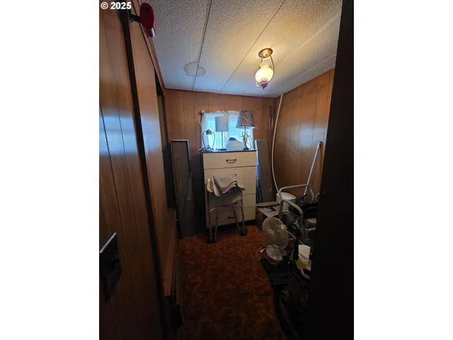 a view of a hallway with workspace