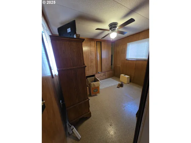 a view of a hallway with workspace