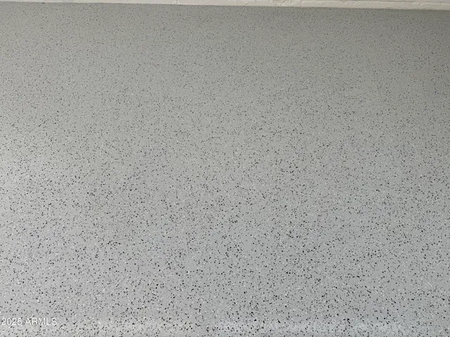 a close up of a white marble wall